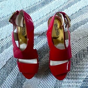 Michael kors red patent leather platform sandals, 4 in heel .worn once.